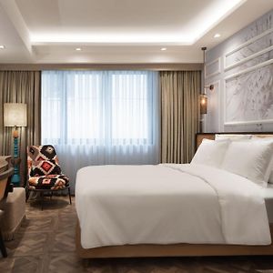 Kamer met een Queen Size Bed